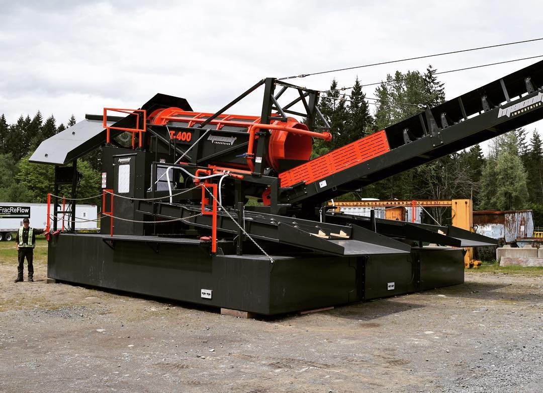 Macon T-400 gold trommel wash plant with conveyor system and material processing setup at a mining site